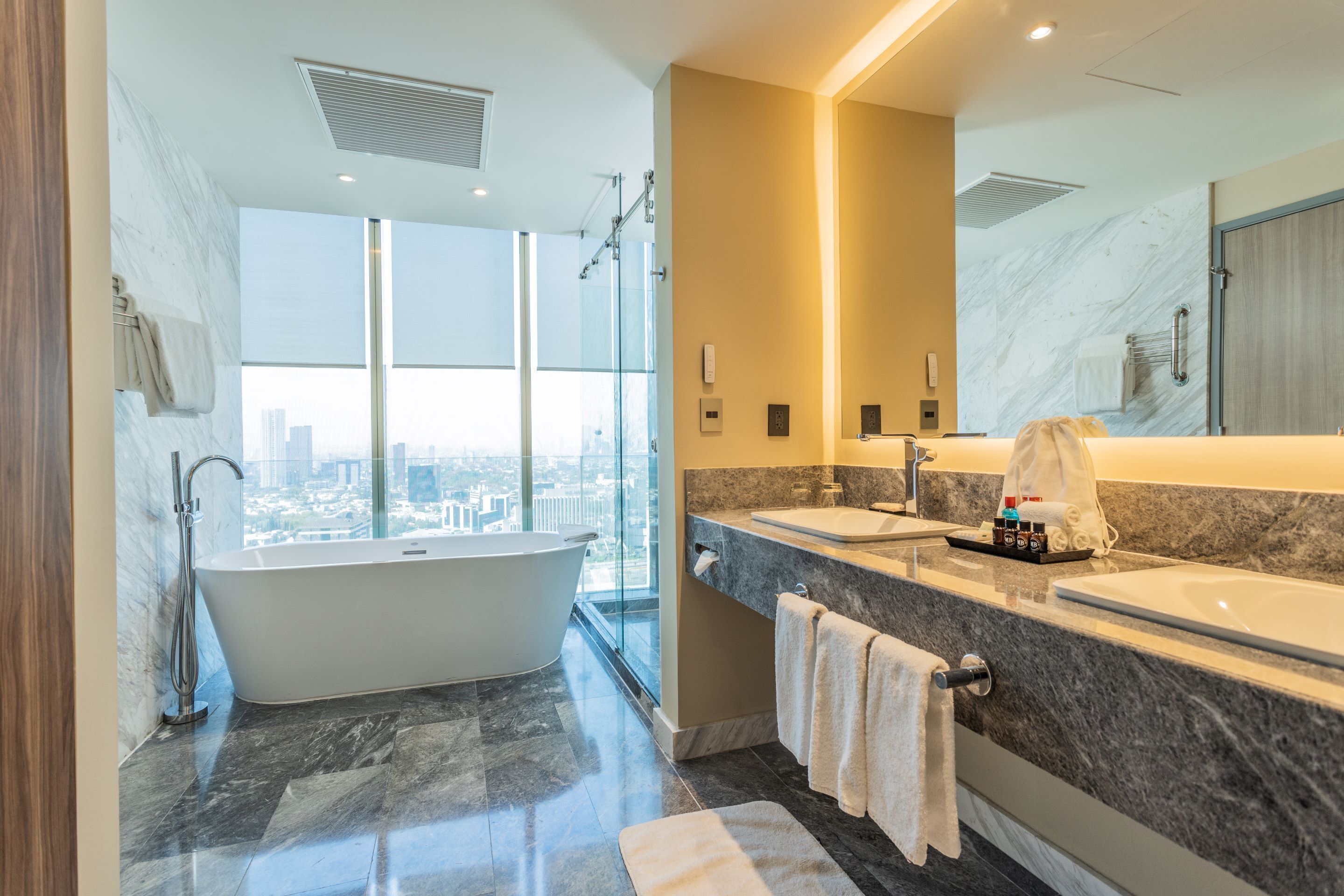 master suite | bathroom | shower, free toiletries, hair dryer, towels