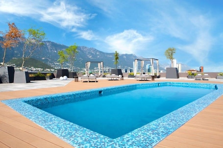 Outdoor pool, sun loungers