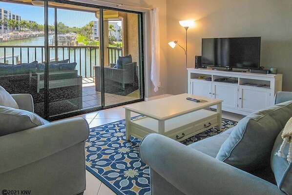 Condo, 1 Bedroom | Living room | TV - Estero Yacht & Racquet 123 1 Bedroom Condo by Redawning (Fort Myers Beach)