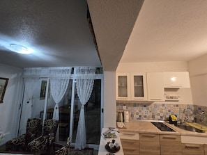 Studio, Terrace | Private kitchen | Fridge, coffee/tea maker, electric kettle, highchair