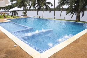 Outdoor pool, pool umbrellas, pool loungers