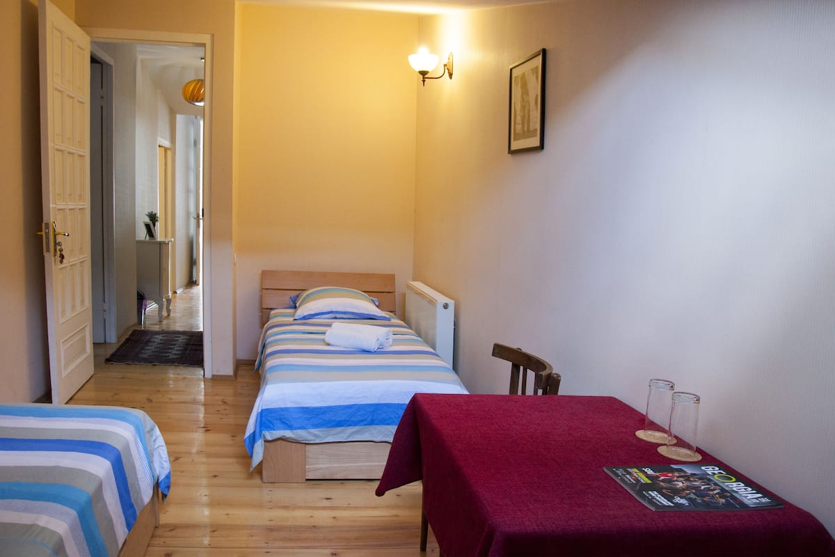 Twin Room, Shared Bathroom | Iron/ironing board, free WiFi, bed sheets