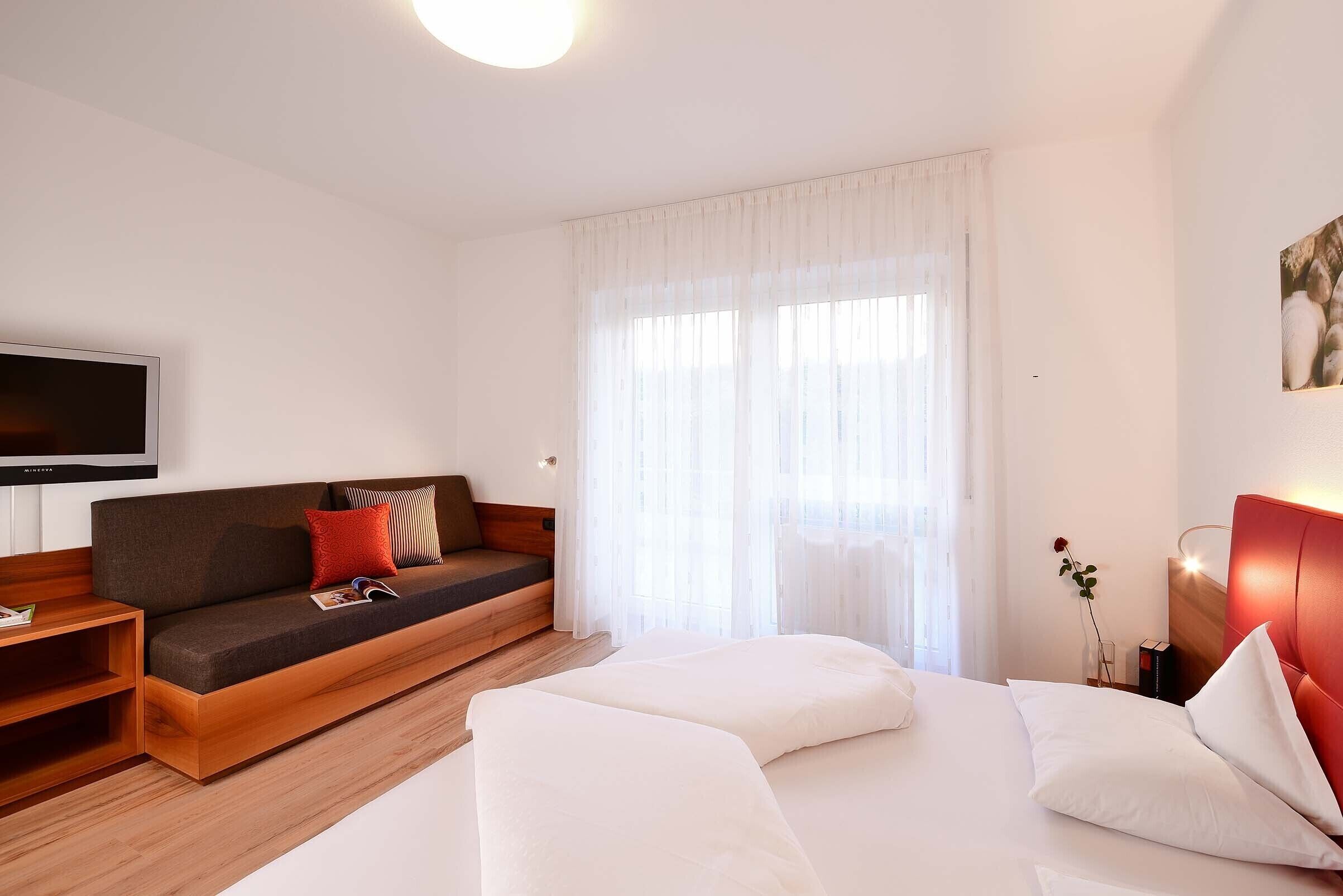Junior Suite, Patio | Hypo-allergenic bedding, in-room safe, desk, free WiFi