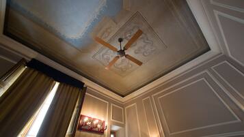 Family Room, City View | Minibar, in-room safe, desk, laptop workspace