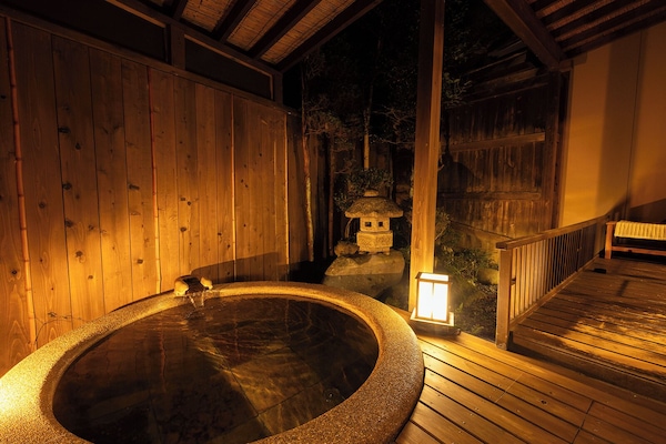 Japanese Style Room with Low Bed and Open-air Bath | Bathroom | Slippers, bidet, towels