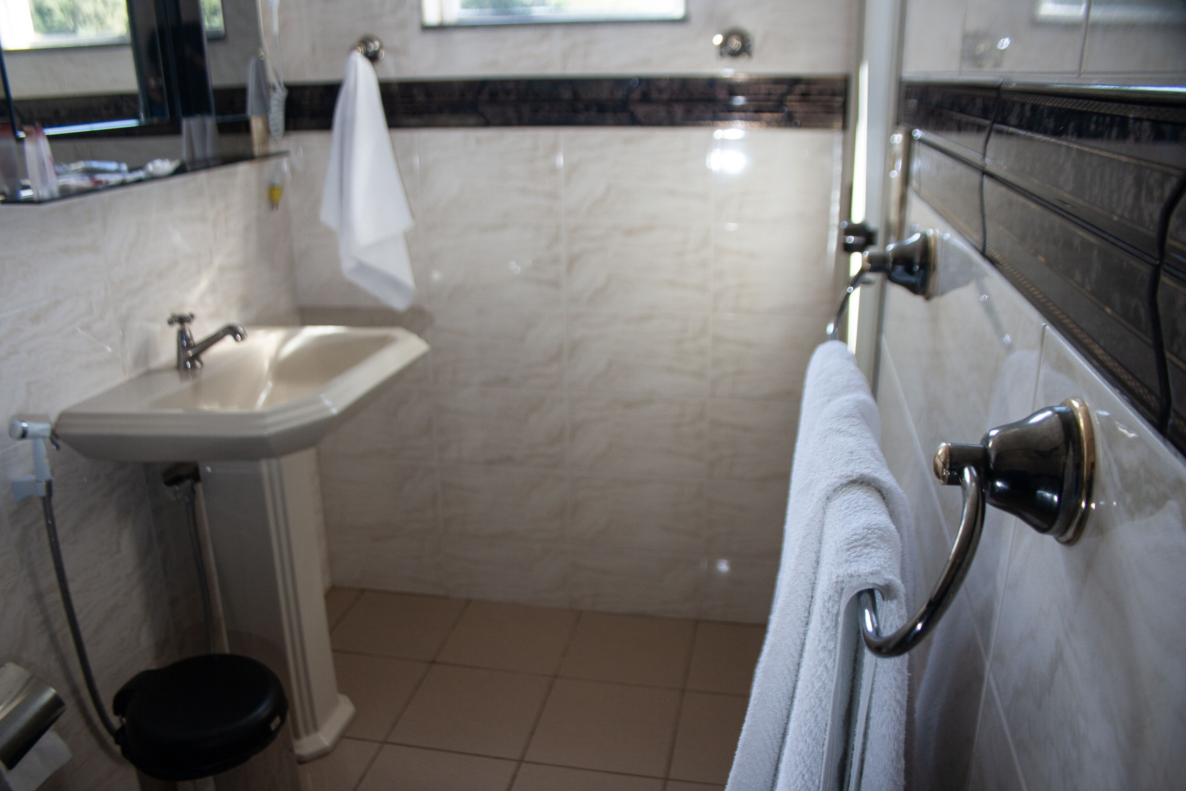 family room | bathroom | shower, free toiletries, hair dryer, towels