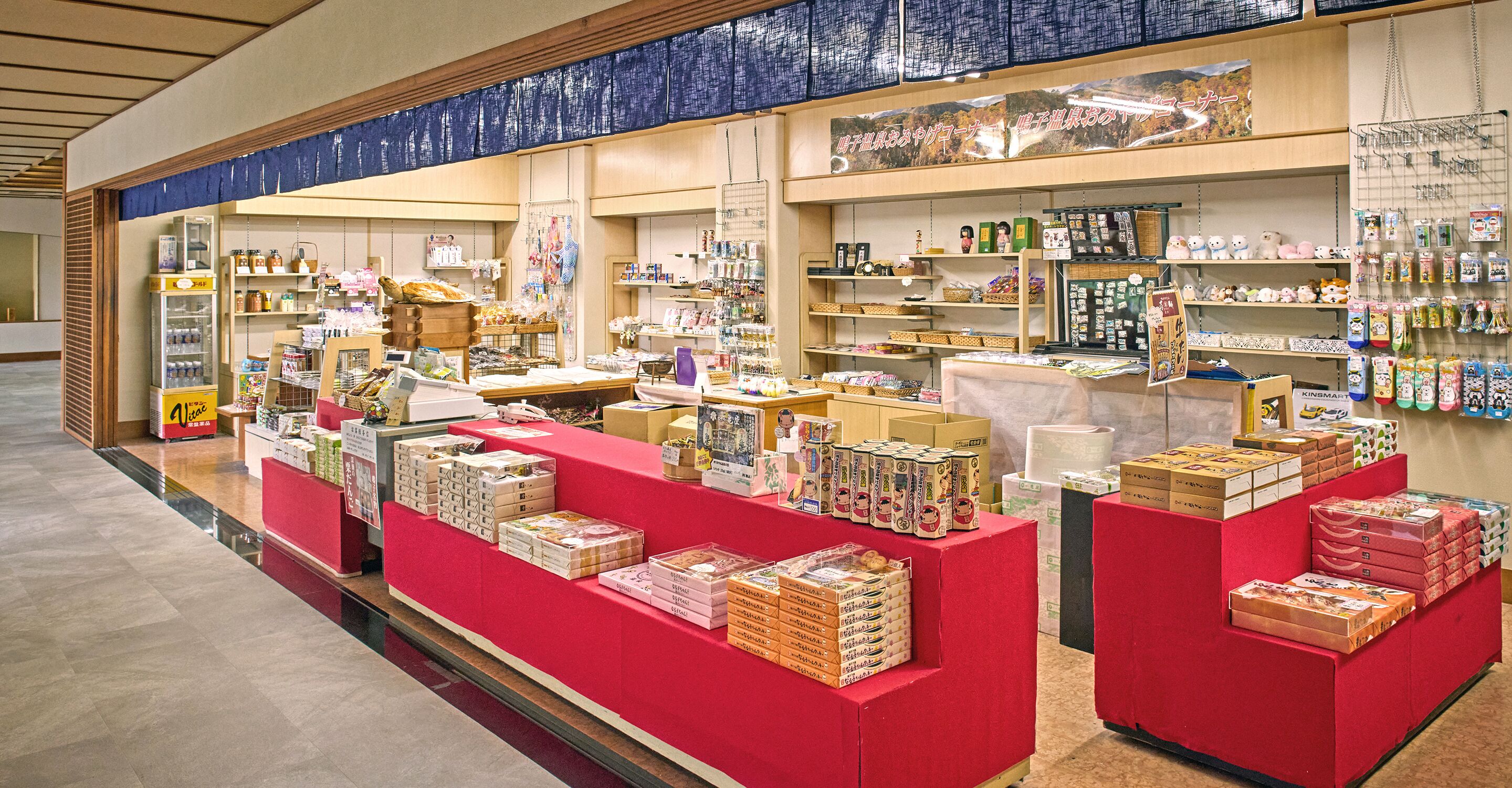A store with various products on display, including boxes and shelves with items.