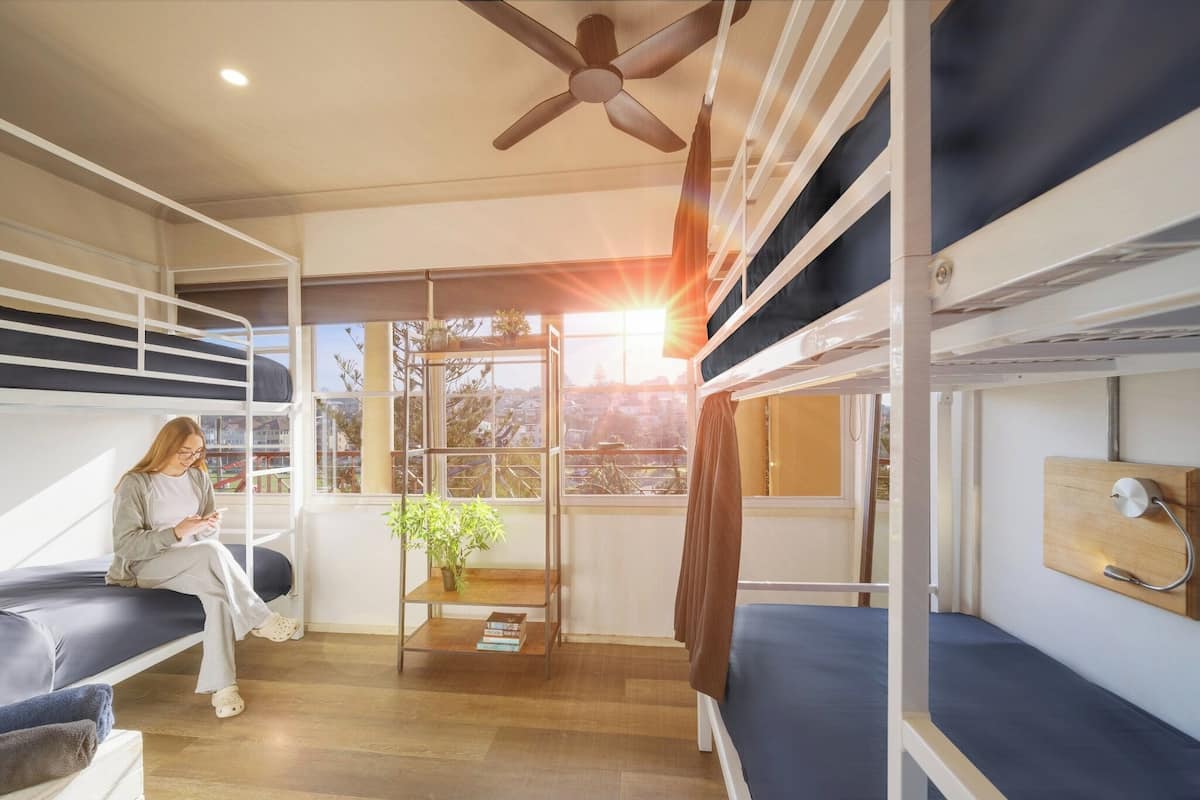 Bed in 4-Bed Female Dorm with Shared Bathroom | Iron/ironing board, bed sheets