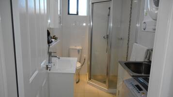 Shower, deep soaking tub, free toiletries, hair dryer