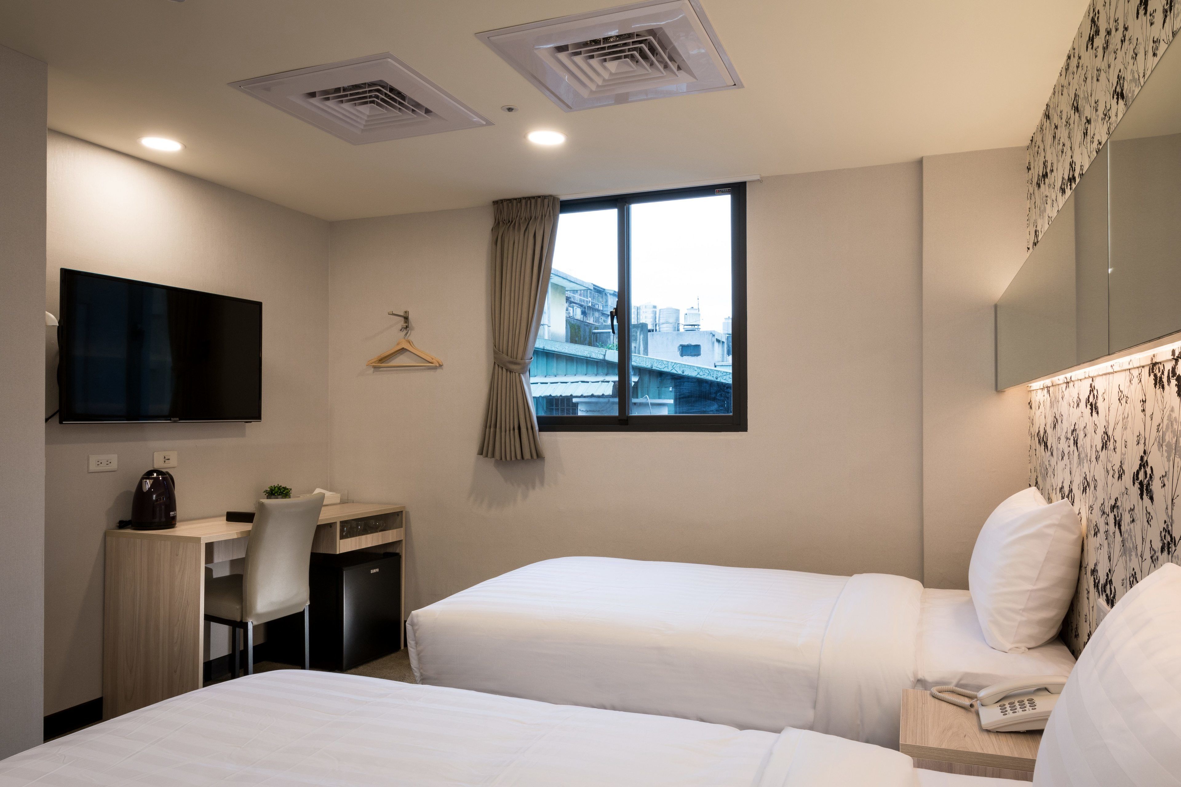 business twin room | desk, blackout curtains, cots/infant beds, rollaway beds