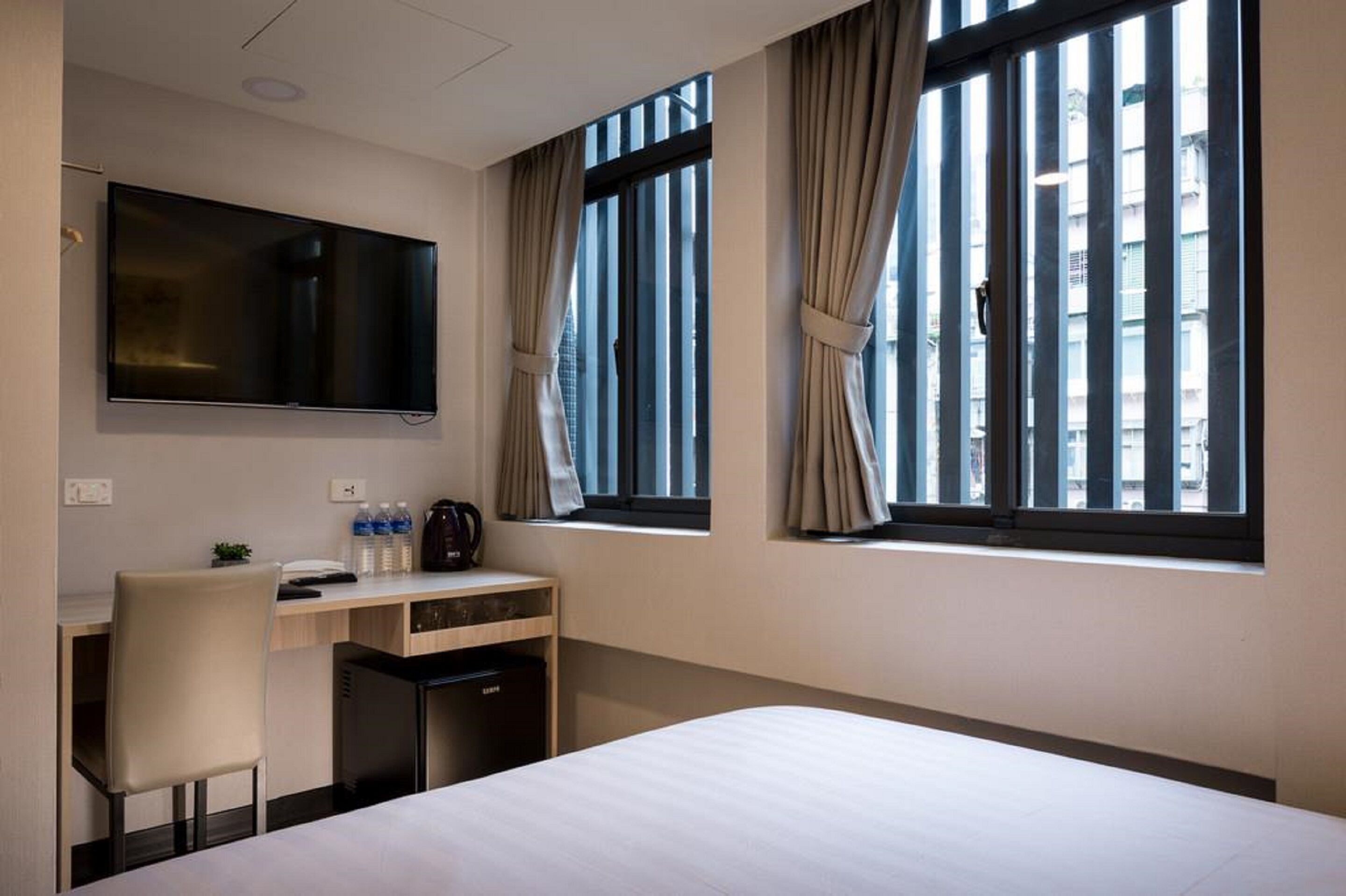 standard triple room | desk, blackout curtains, cots/infant beds, rollaway beds