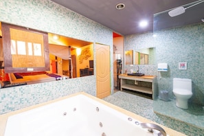 Douche, douche à « effet pluie », articles de toilette gratuits