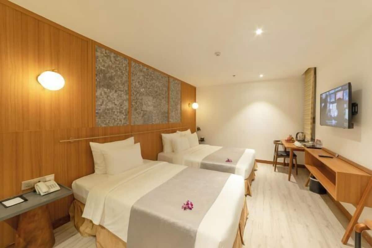 Literie hypoallergénique, minibar, coffres-forts dans les chambres