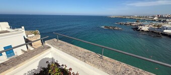 Typical house with terrazzo overhanging seen sea