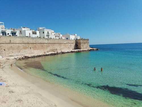 Typical house with terrazzo overhanging seen sea