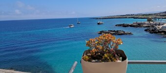 Typical house with terrazzo overhanging seen sea