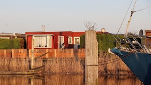 Exterior - Chalet Gaby with sauna, private dock, and canoes at Lauwersmeer (Anjum)