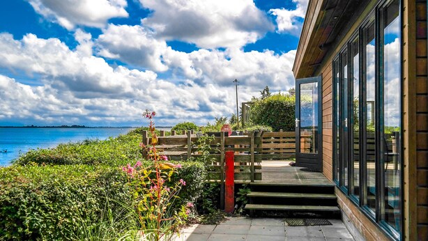 Terrace/patio - 6 pers Lauwersmeer waterfront, Full equipped and modern house with sauna (Anjum)
