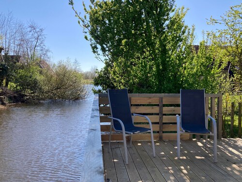 Cozy house ‘heide’ 6p at a canal near lake Lauwersmeer