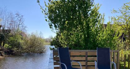 Cozy house ‘heide’ 6p at a canal near lake Lauwersmeer