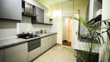 MamaMia Studio Apartment | Private kitchen | Fridge, microwave, coffee/tea maker