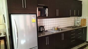 Fridge, microwave, stovetop, coffee/tea maker