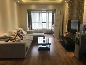 Deluxe-Zimmer | Wohnzimmer | Flachbildfernseher