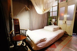 Desk, blackout curtains, rollaway beds