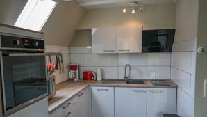 Coffee/tea maker, fridge, oven, stovetop - 6 persons - Holiday home with partially covered terrace and large open kitchen (Anjum)