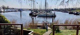 2 pers - house König lakeside of the Lauwersmeer with own fishing pier Sauna