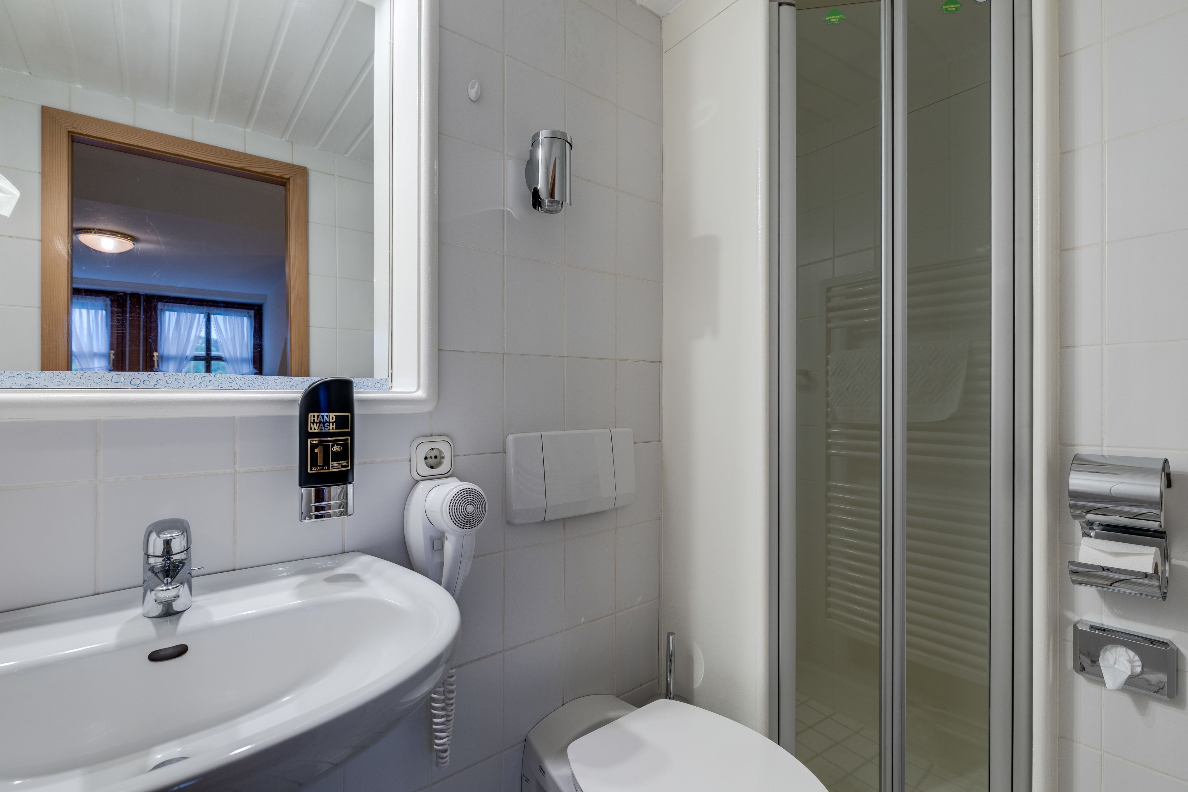 free toiletries, hair dryer, dressing gowns, towels