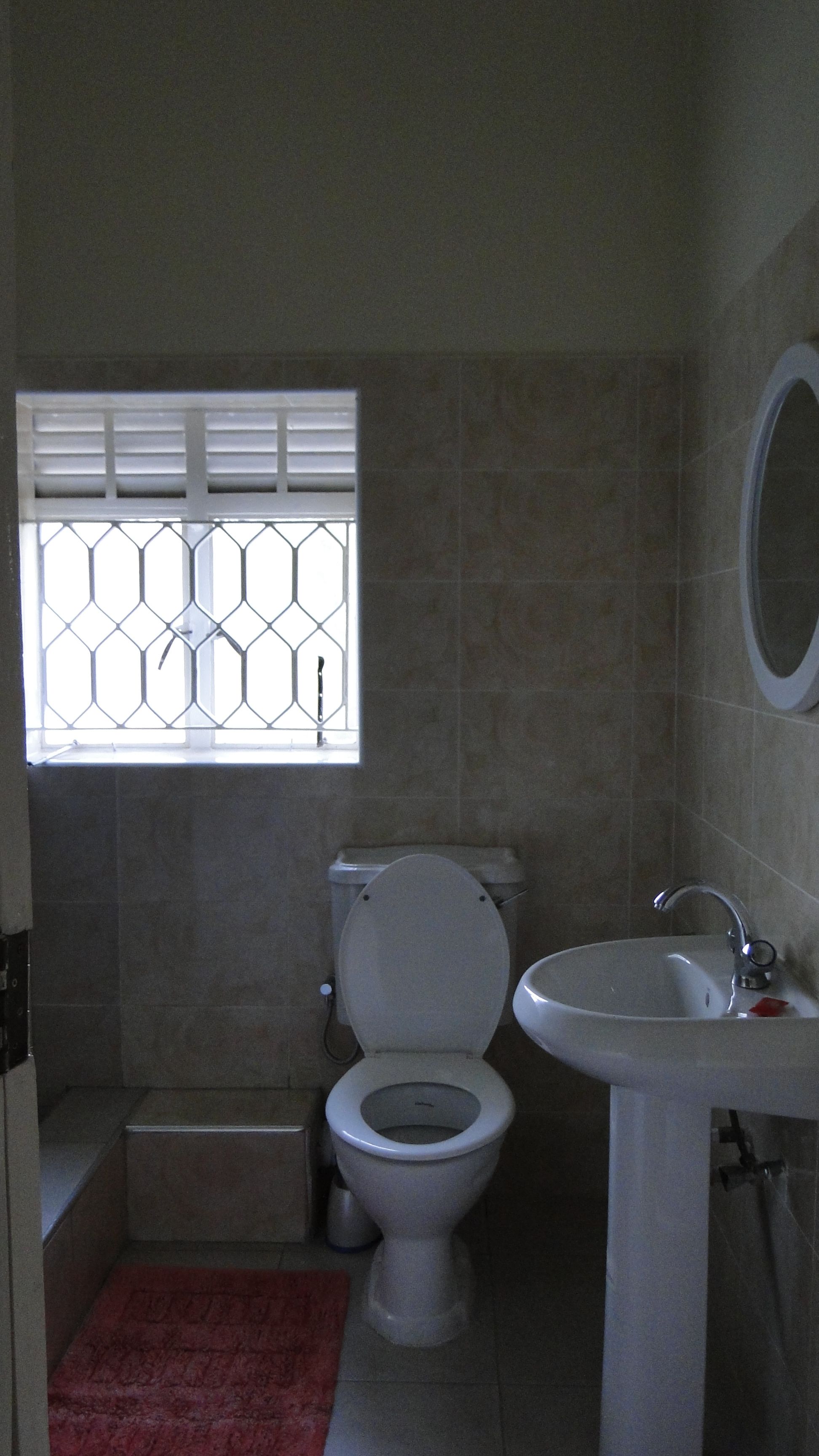 deep-soaking bathtub, rainfall showerhead, free toiletries, slippers