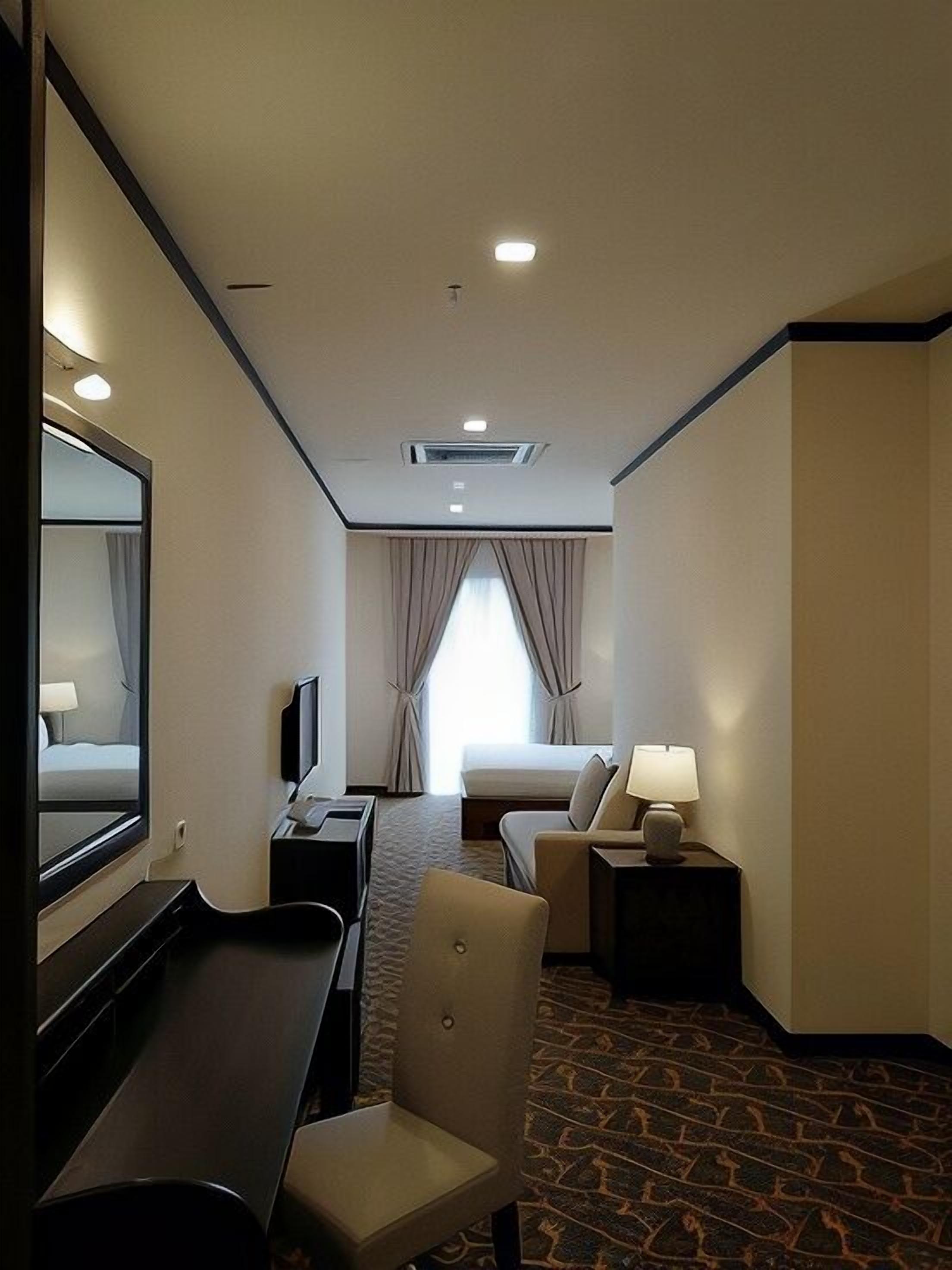 Premium bedding, down comforters, desk, laptop workspace