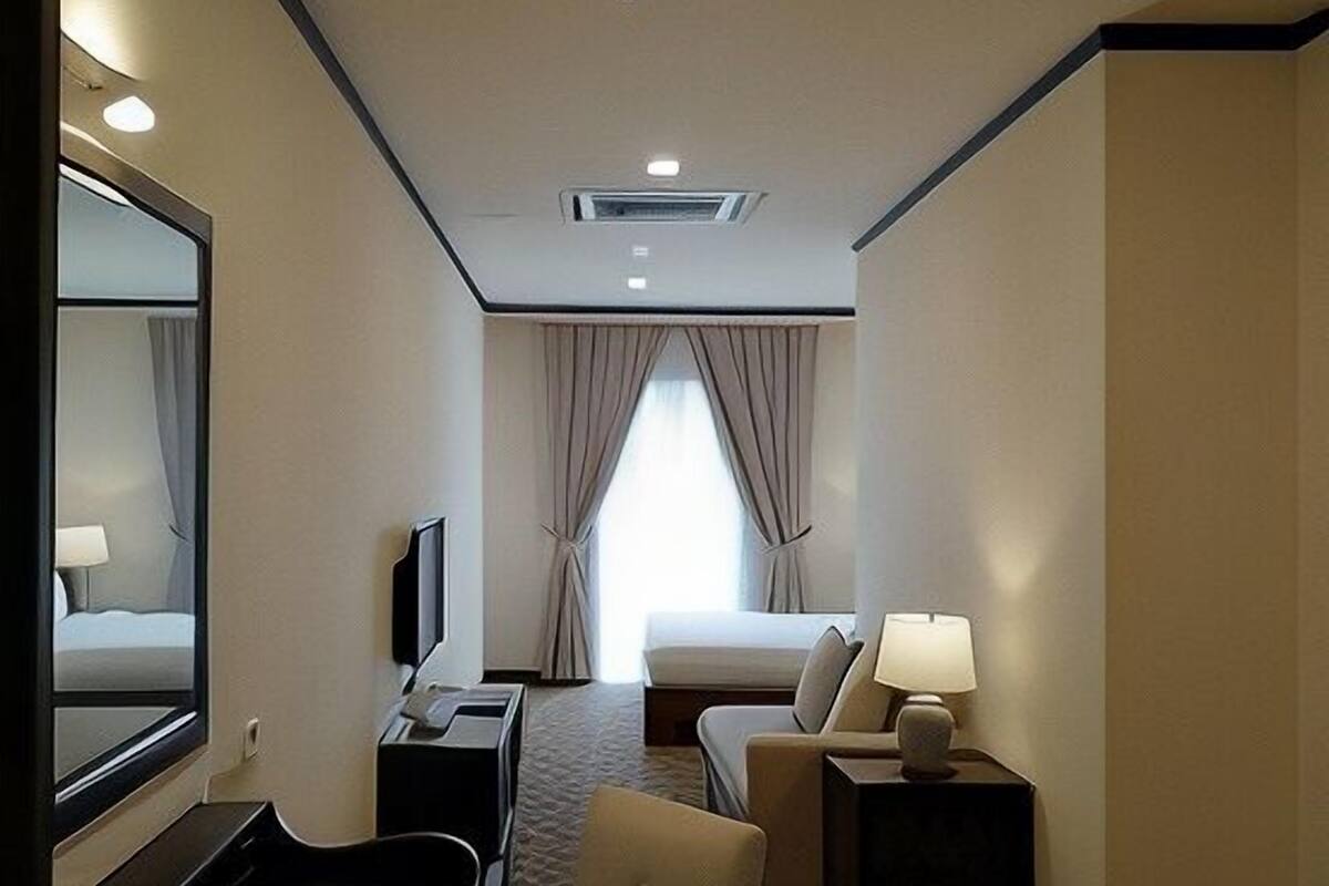 Premium bedding, down duvets, desk, laptop workspace