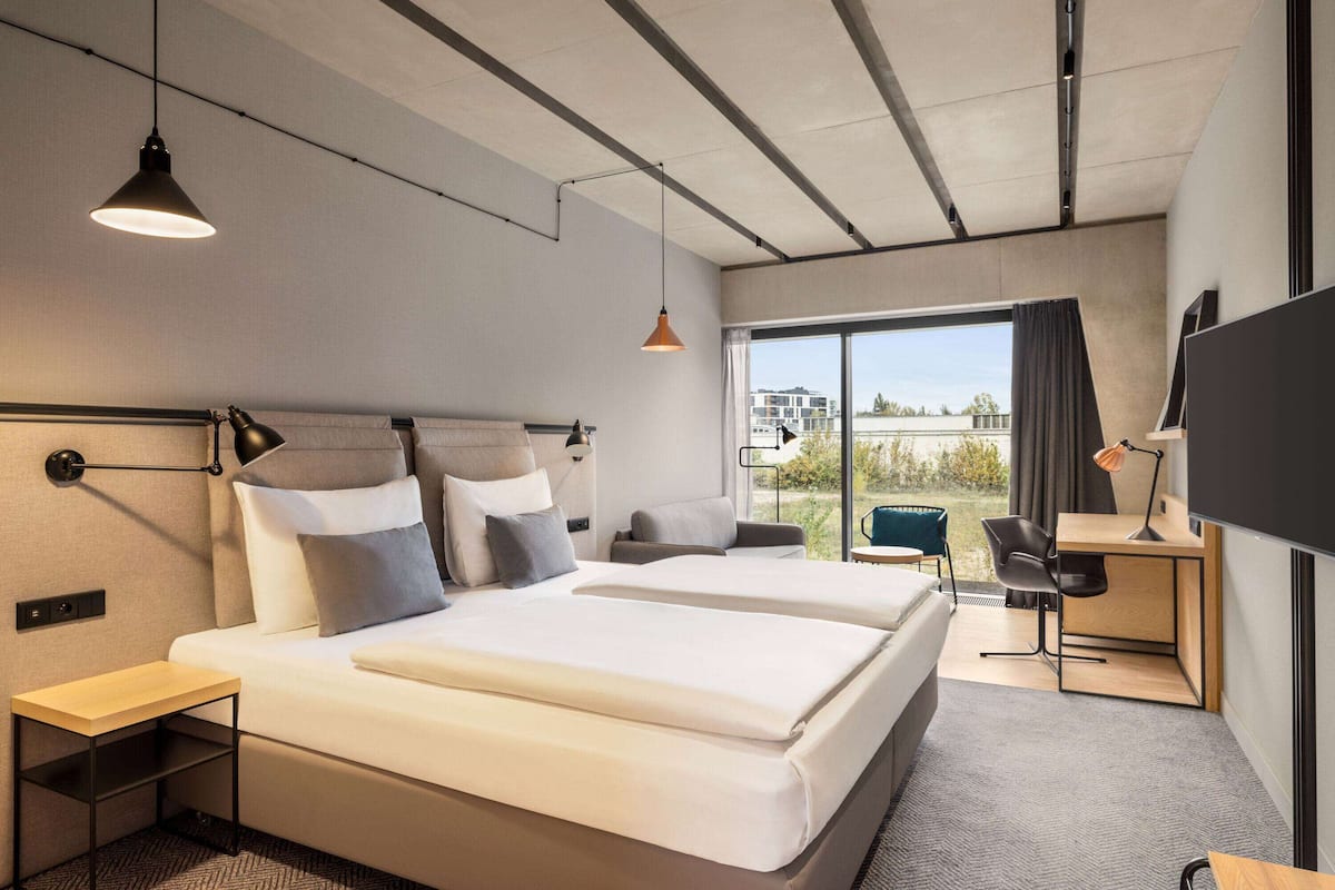 hypo-allergenic bedding, in-room safe, desk, blackout curtains