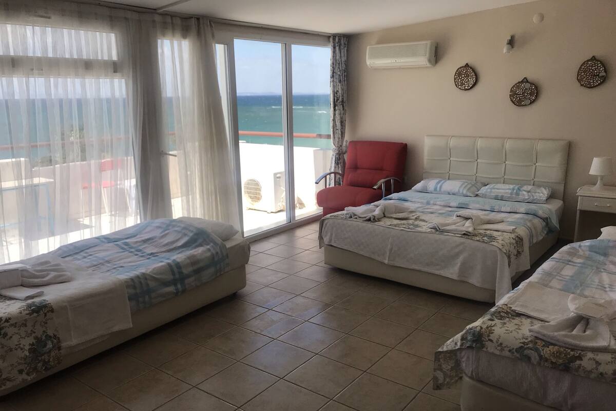 Family Quadruple Room, Multiple Beds, Balcony, Sea View | In-room safe, desk, WiFi (free)