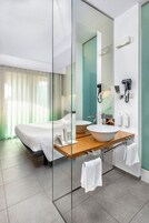 Exclusive Suite, 2 Bedrooms, 2 Bathrooms, Sea View | Minibar, soundproofing, free cribs/infant beds, free WiFi