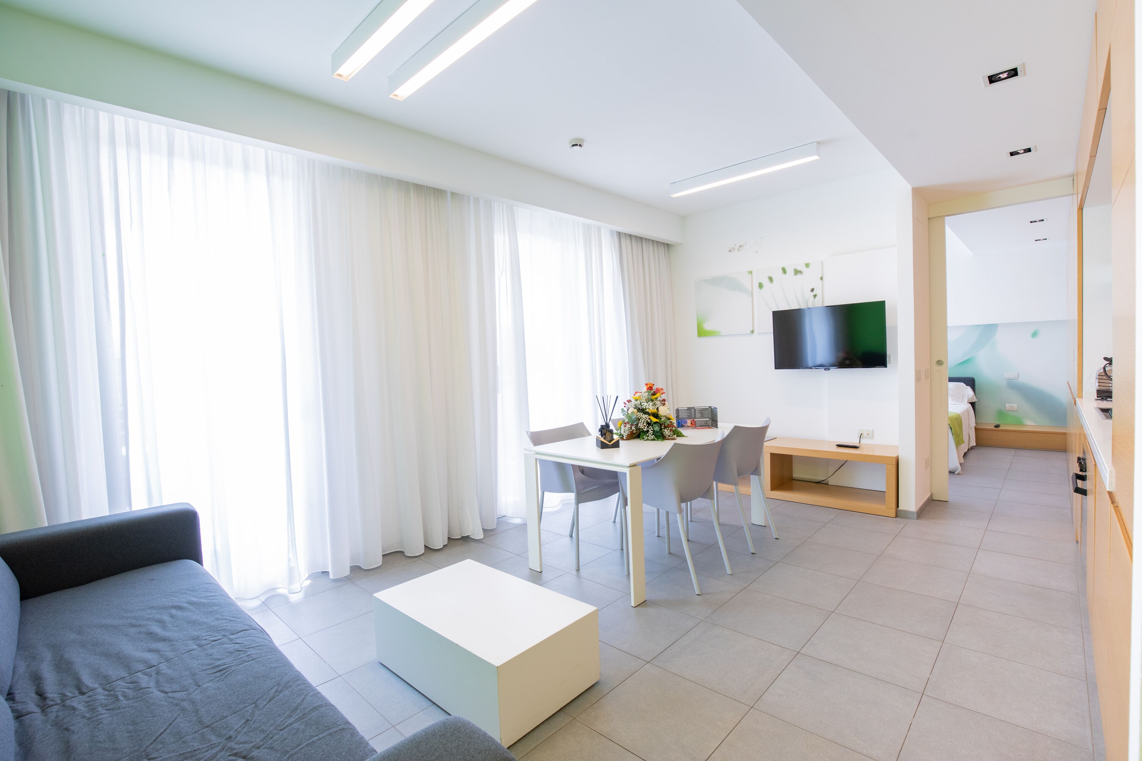 Phòng Suite Deluxe, 1 phòng ngủ, quang cảnh một góc biển | Minibar, phòng cách âm, nôi (giường cho trẻ sơ sinh) miễn phí 