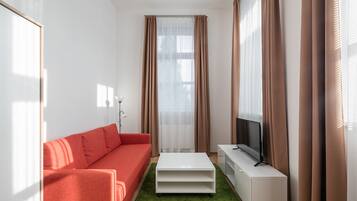 Duplex | Living area | Flat-screen TV