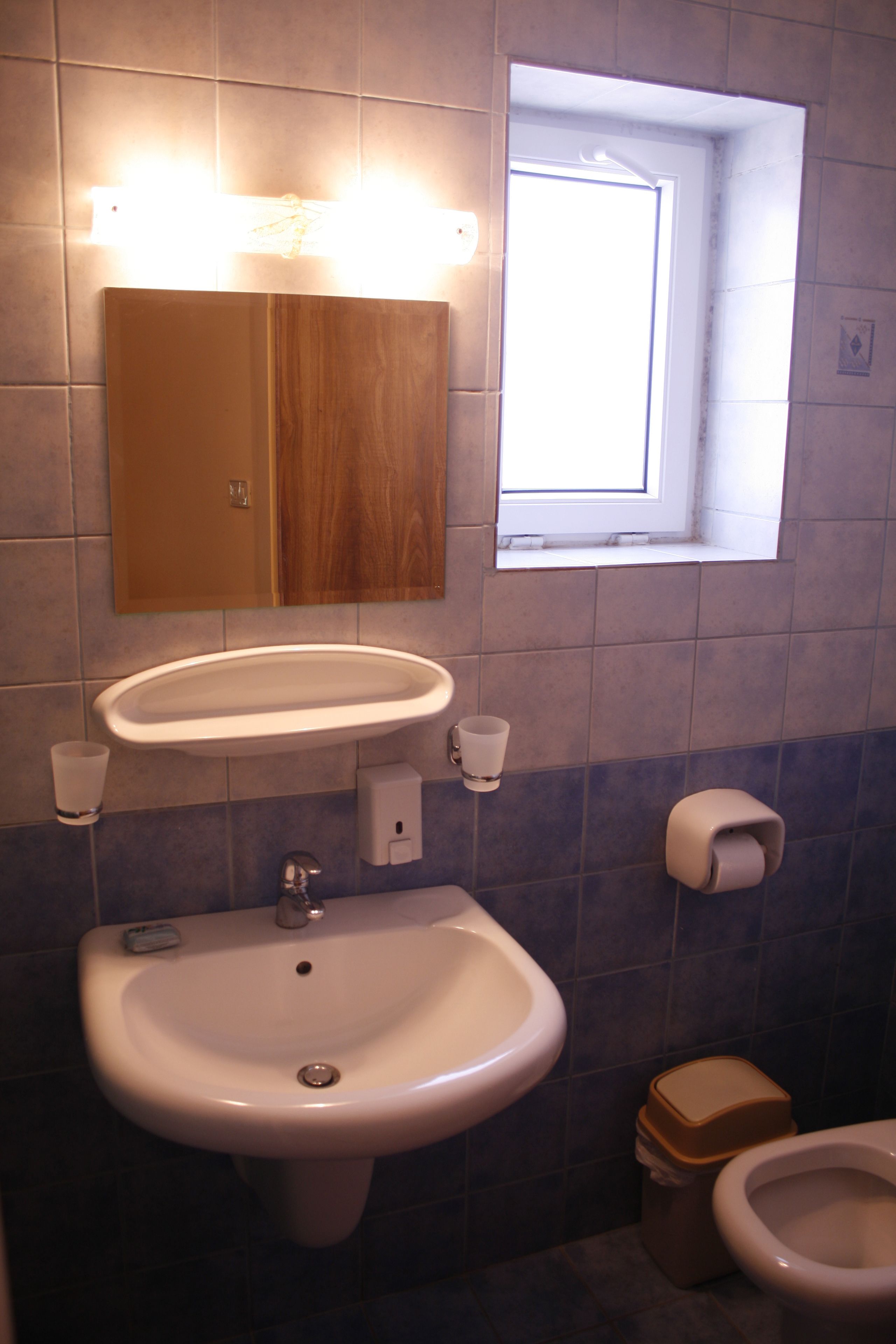 deep-soaking bathtub, hair dryer, towels