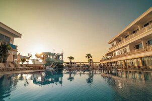 2 outdoor pools, open 8:00 AM to 6:30 PM, pool umbrellas, sun loungers