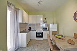 Panoramic Duplex, Sea View, Sea Facing (Nireus) | Private kitchen | Fridge, microwave, oven, stovetop