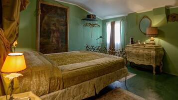 A bedroom with a bed, a dresser, a mirror, and a painting on the wall.