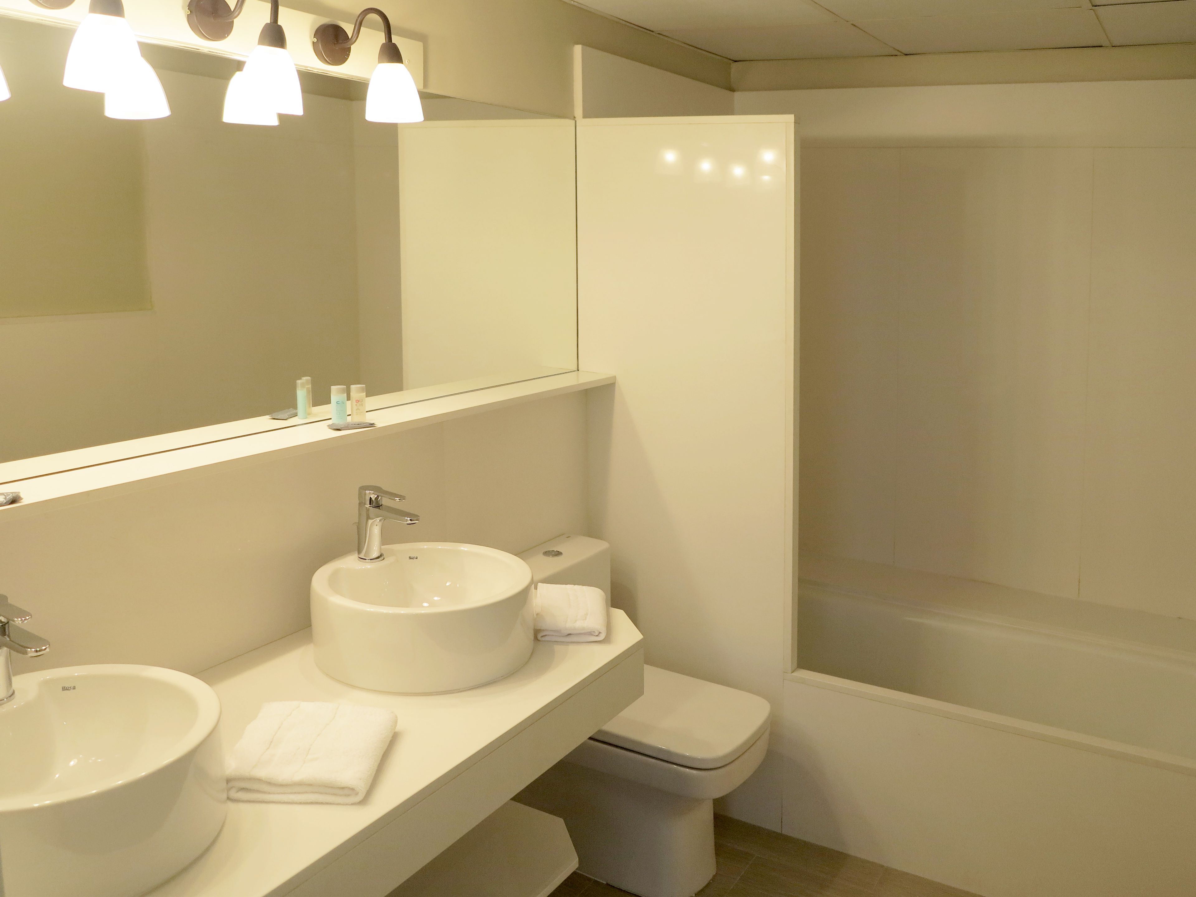 suite | bathroom | hair dryer, towels