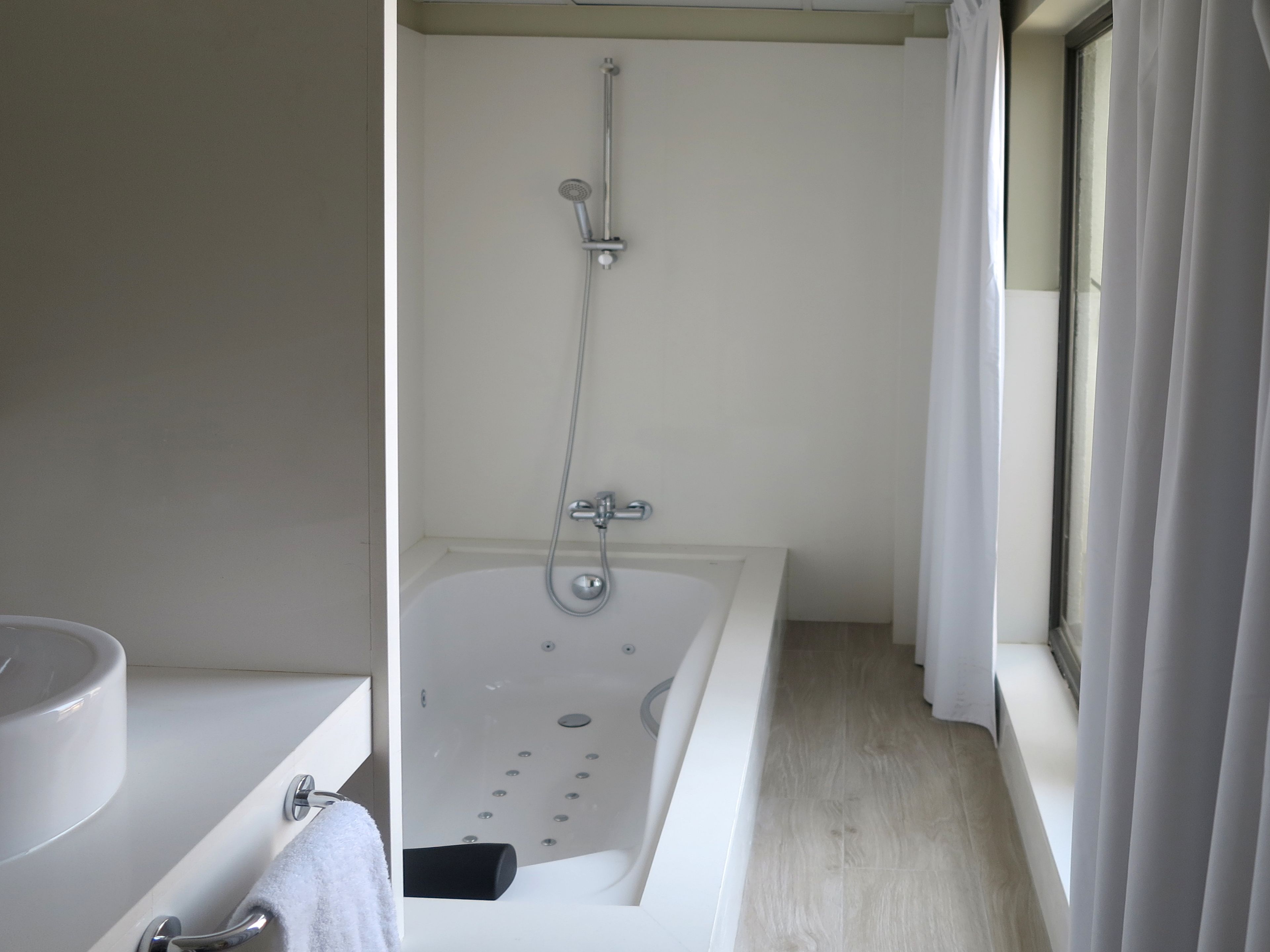 suite, city view (hydromassage bath) | bathroom | hair dryer, towels