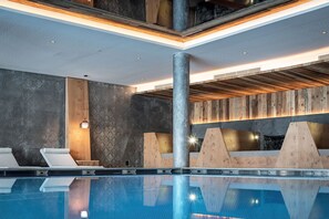 Indoor pool, outdoor pool, pool umbrellas, sun loungers