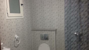 Apartment, 2 Bedrooms | Bathroom | Shower, rainfall showerhead, hair dryer, towels