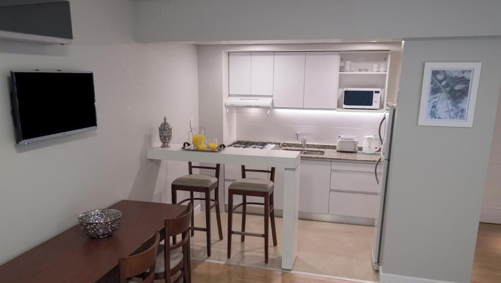 Junior Room, 1 Bedroom | Living area | 39-inch LED TV with cable channels, printers