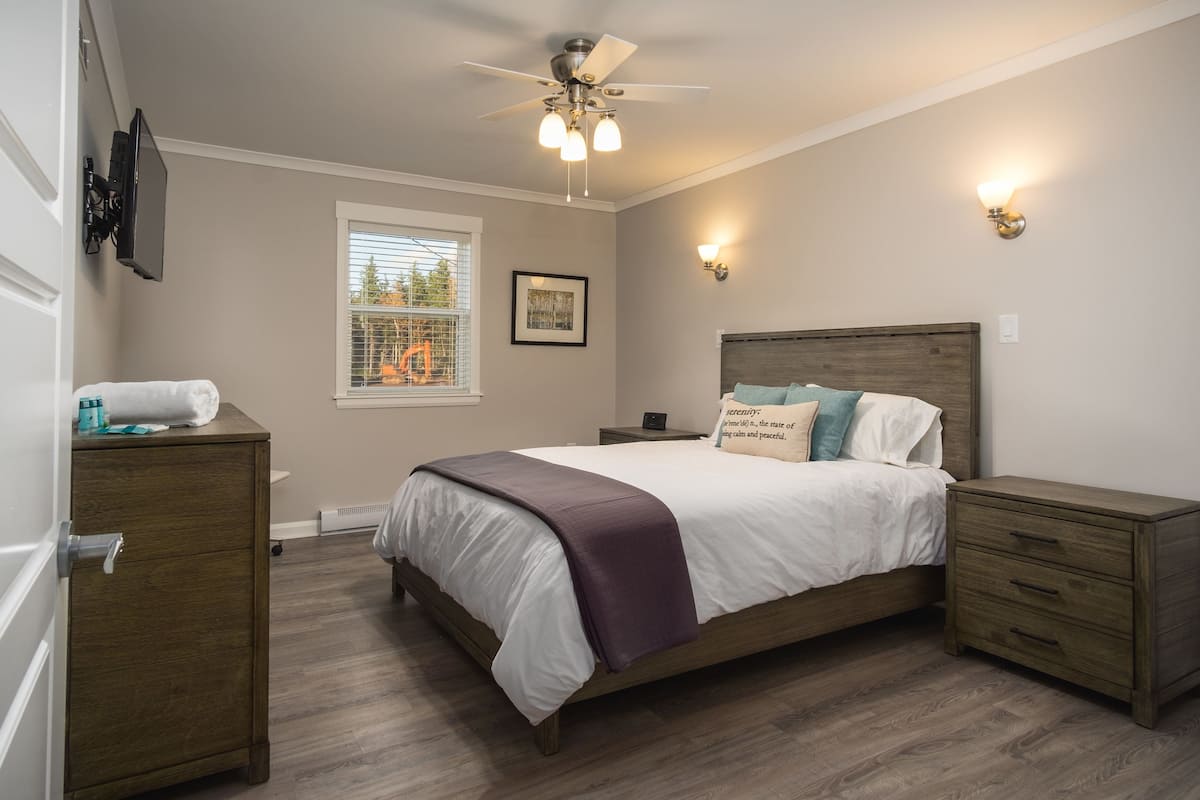 Premium bedding, pillowtop beds, laptop workspace, blackout drapes