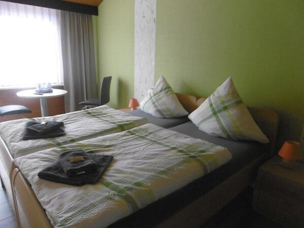 Desk, blackout curtains, rollaway beds, free WiFi